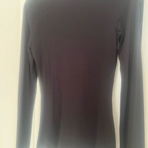 Beautiful never worn top. Perfect for the upcoming holidays.